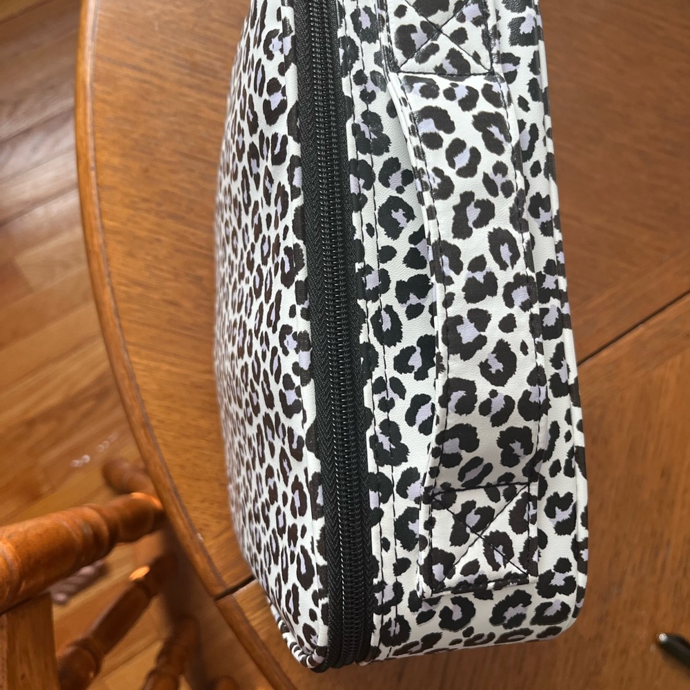 Cheetah print make up bag.  Like new. Smoke-free home.